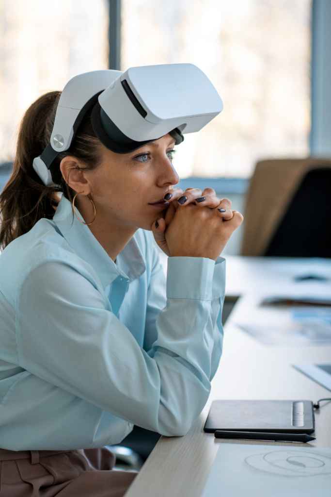 Architect using a VR headset to interact with a digital building model